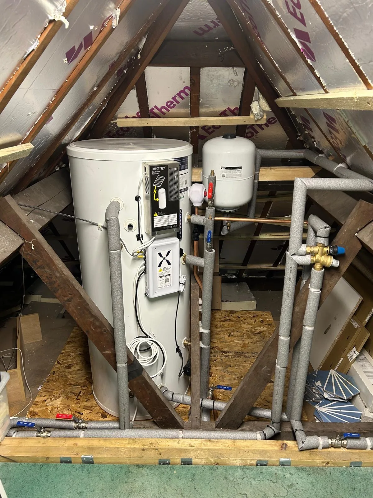 Unvented cylinder fitted in utility cupboard